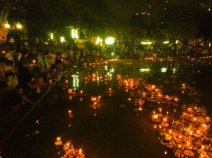 Candles on the Loy Krathongs lighting up the lake