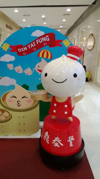 I think this is a mascot for a Chinese dumpling place.  Cute little guy.