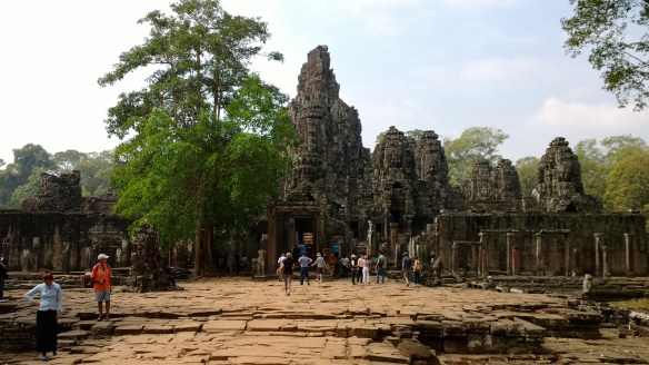 Entering Bayon temple at Angkor Thom.