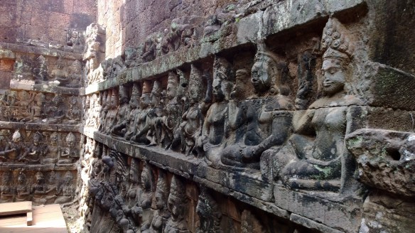 Wall of stone carvings.  Every image unique and different, but done with amazing precision.