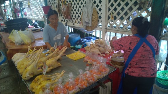 Sweet ladies, chopping chickens.