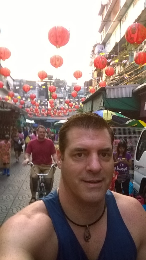 Riding through the Chinatown market